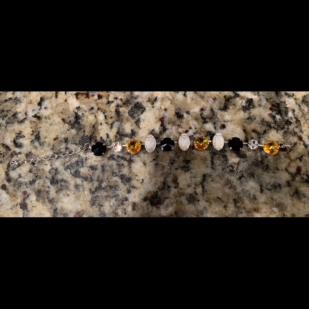 Swarowski crystal football bracelet.